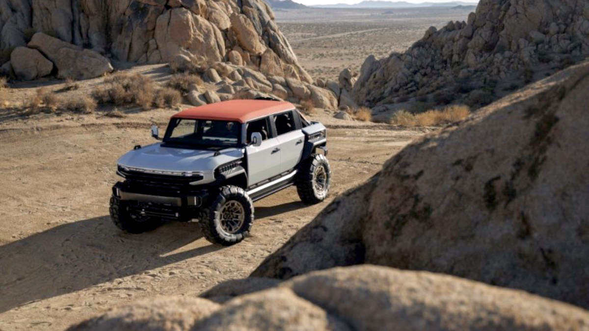 GM just revealed the mid-size GMC Hummer X electric truck and SUV concepts featuring built-in trail drones and 3D metal tech. Read the full specs here!