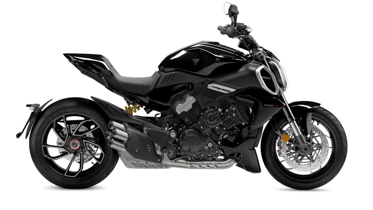 The radical Ducati Diavel V4 lands in India starting at ₹29.08 Lakh! Dive into the 168 hp V4 engine, 240mm rear tire, and advanced tech specs. Read more!